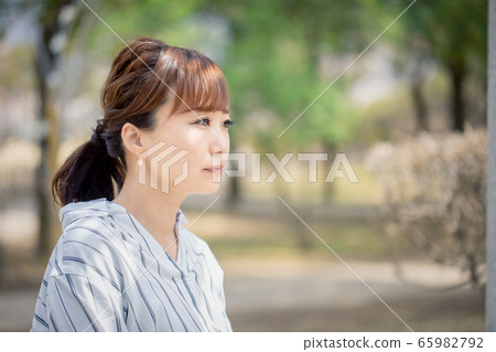 Asian woman with sad expression Asian woman with sad expression 65982792