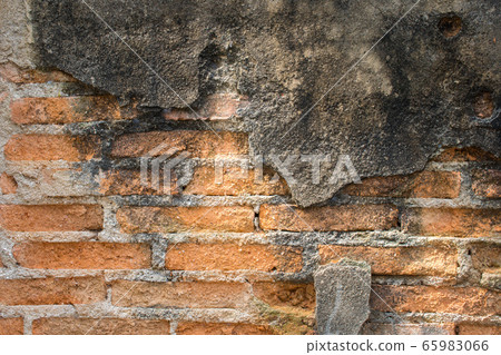 Old brick wall textures and pattern of vintage brick wall. Old brick wall with peeling plaster, grunge background. Old brick wall textures and pattern of vintage brick wall. Old brick wall with peeling plaster, grunge background. 65983066