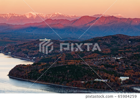 Mt. Mikuni Ridge and gunwood head from the Southern Alps and Lake Yamanaka at sunrise 65984259