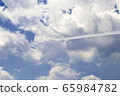 Blue impulse flies through the city center 65984782