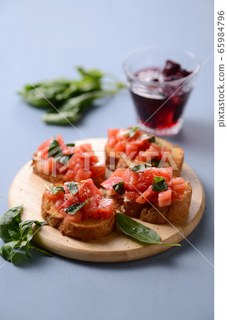 Bruschetta with tomato and basil 65984796