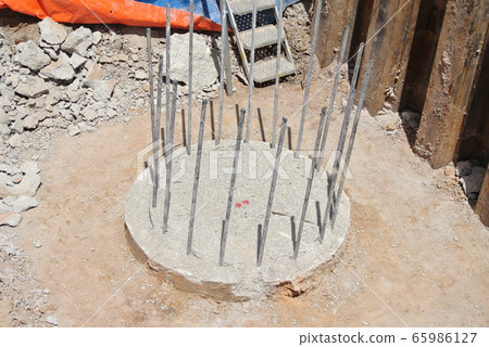 JOHOR, MALAYSIA -MARCH 28, 2016: Excavated and cut to level bore pile at the construction site. Ready to construct a pile cap reinforcement bar as the next step of work.  65986127