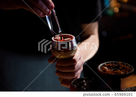 Shisha hookah with red hot coals. Modern hookah 65989101