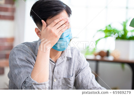 man has fever or headache man has fever or headache 65989279