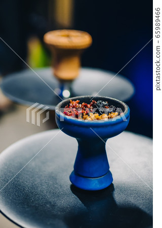 tobacco are mixed in bowl of hookah for traditional Asian holiday and Smoking 65989466