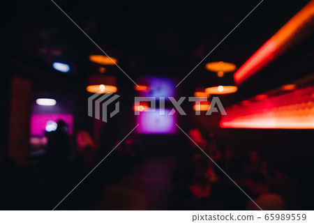 interior night restaurant with the rest blurred and out of focus by people and color interior night restaurant with the rest blurred and out of focus by people and color 65989559