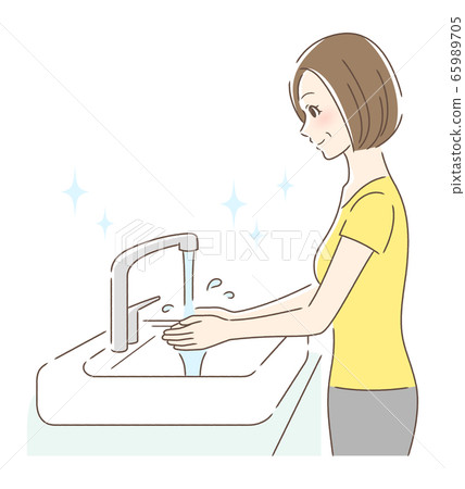 A woman washing her hands with tap water 65989705