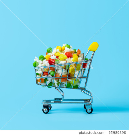 Frozen vegetables assorted on blue, top view 65989898