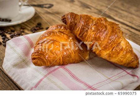 Croissant and coffee Croissant and coffee 65990375
