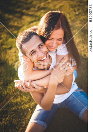 Young couple in love in nature Young couple in love in nature 65990788