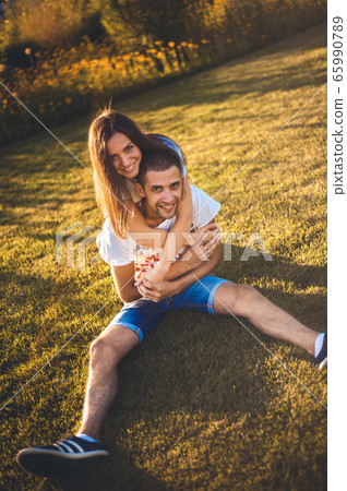 Young couple in love in nature Young couple in love in nature 65990789