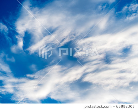 White clouds against blue sky background 65992305