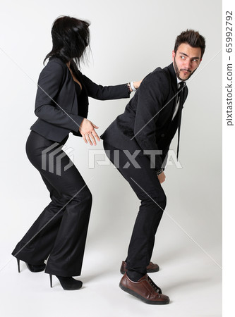 Fashion man and woman. The concept of female domination 65992792