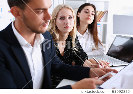 Group of people deliberate on problem Group of people deliberate on problem 65992823