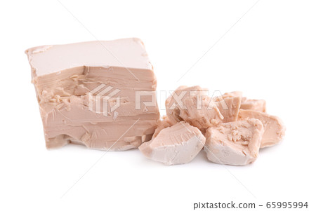 Fresh pressed yeast, isolated on white background. Fresh pressed yeast, isolated on white background. 65995994