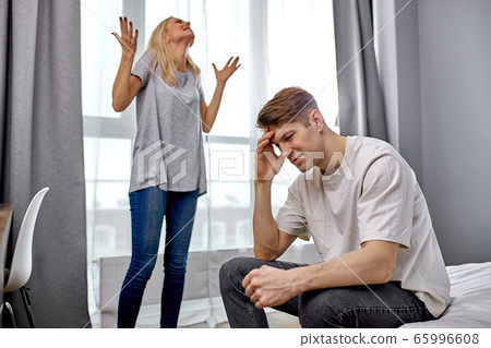 woman tired that her husband is a loafer 65996608
