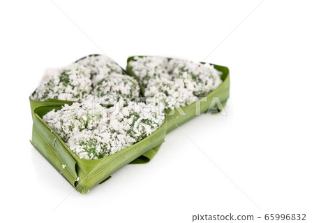 Ondeh ondeh is a traditional Malay snack made of rice ball filled with brown sugar Ondeh ondeh is a traditional Malay snack made of rice ball filled with brown sugar 65996832