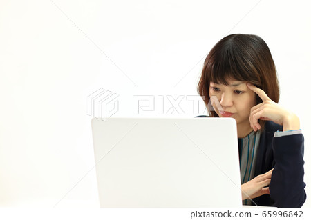 Woman working remotely Copy space available 65996842