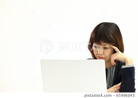 Woman working remotely Copy space available 65996843
