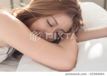 Portrait of beautiful Asian woman with attractive Portrait of beautiful Asian woman with attractive 65998064