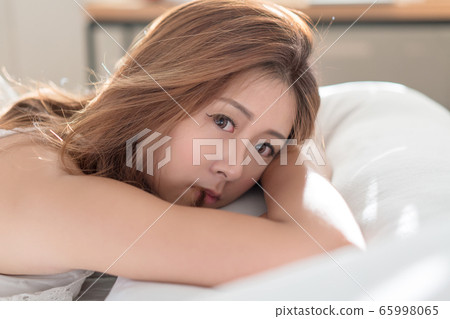 Portrait of beautiful Asian woman with attractive 65998065