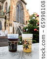 Two christmas glasses with mulled wine . 65998108
