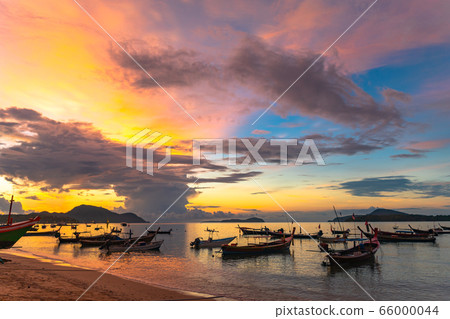 beautiful sunrise above fishing boats beautiful sunrise above fishing boats 66000044