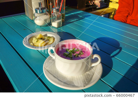 Cold beetroot soup with sour cream, greens and hot Cold beetroot soup with sour cream, greens and hot 66000467