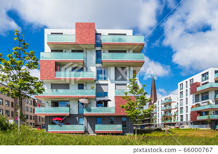 Modern buildings and old church in the city 66000767