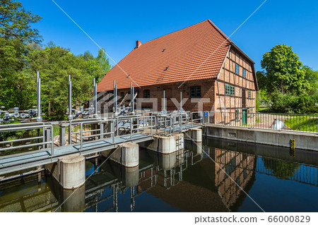 Historical water mill with trees in Kuchelmiss Historical water mill with trees in Kuchelmiss 66000829