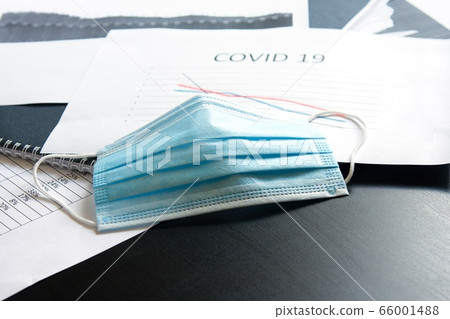 BLue medical mask on chart for reducing incidence BLue medical mask on chart for reducing incidence 66001488