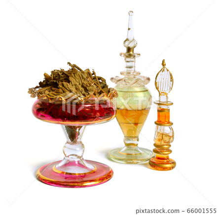 Dried Pachouli plant with vintage perfume bottle. Dried Pachouli plant with vintage perfume bottle. 66001555