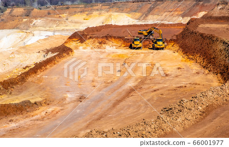 Big truck works at sand quarry Big truck works at sand quarry 66001977