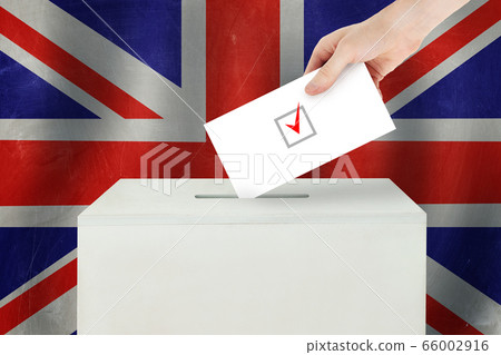 UK Vote concept. Voter hand holding ballot paper UK Vote concept. Voter hand holding ballot paper 66002916