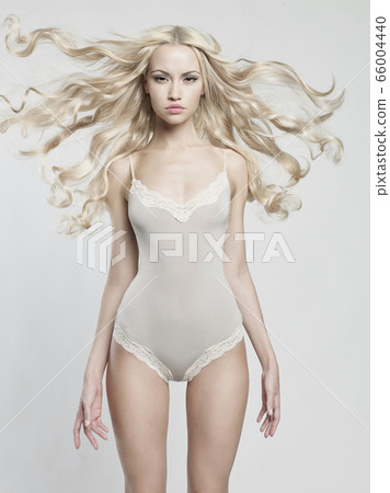 Portrait of beautiful woman. Sexy blonde with long Portrait of beautiful woman. Sexy blonde with long 66004440