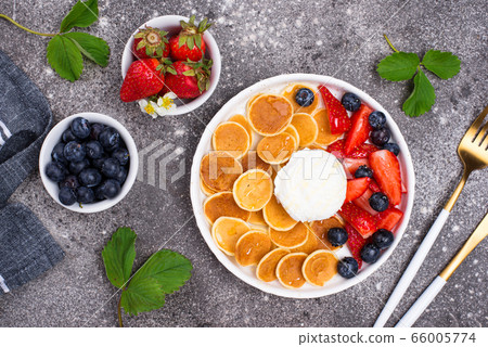 Sweet pancake cereals with berries Sweet pancake cereals with berries 66005774