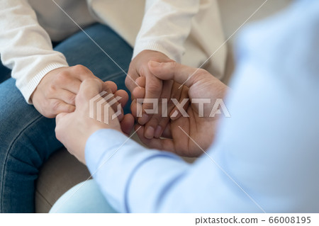 Close up of man hold beloved woman hands showing love 66008195