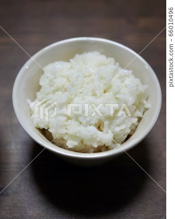 White rice in a ceramic bowl 66010496