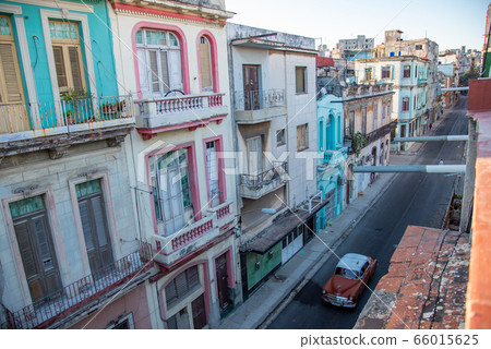 Cuba Havana cityscape Classic car overlooking the road 66015625