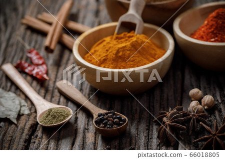 Herbs and spices on the wooden table 66018805