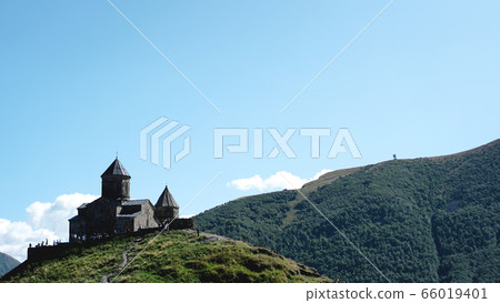 Gergeti Trinity Church, Holy Trinity Church near the village in Georgia Gergeti Trinity Church, Holy Trinity Church near the village in Georgia 66019401