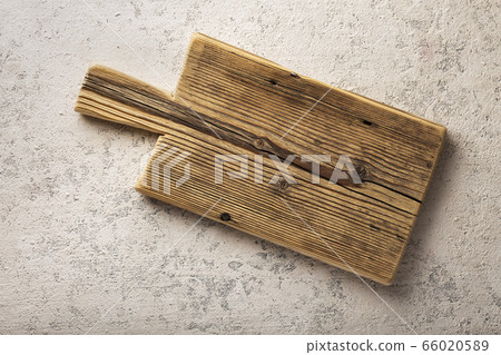 Old kitchen board on a wooden background. concept Old kitchen board on a wooden background. concept 66020589