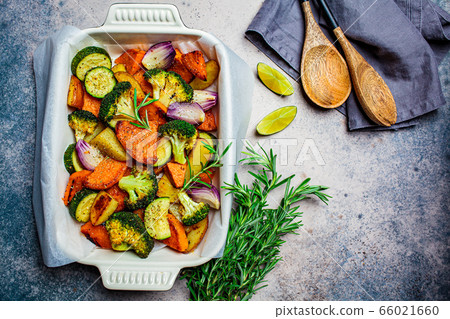 Baked vegetables in the oven dish, top view. Baked vegetables in the oven dish, top view. 66021660