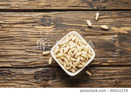 pine nut on the wooden table pine nut on the wooden table 66022259