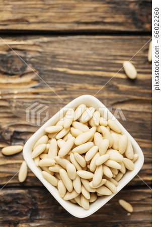 pine nut on the wooden table pine nut on the wooden table 66022260