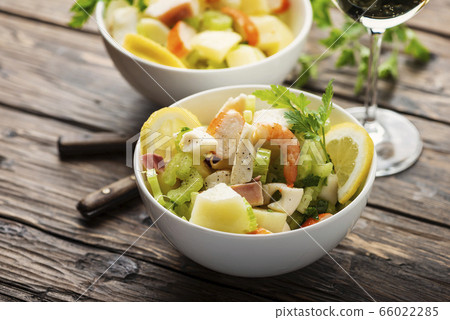 salad with seafood, potato and celery salad with seafood, potato and celery 66022285
