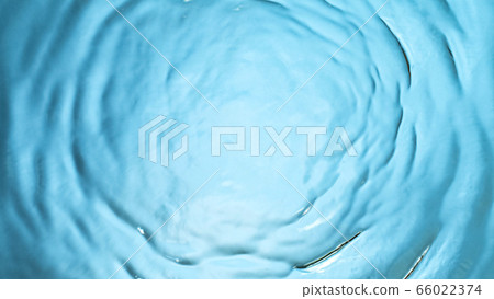 Water surface on light blue background Water surface on light blue background 66022374