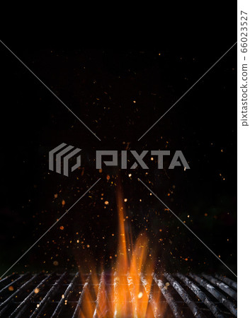 Empty flaming charcoal grill, ready for product Empty flaming charcoal grill, ready for product 66023527