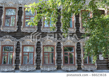 Windows of an old wooden residential building Windows of an old wooden residential building 66023616