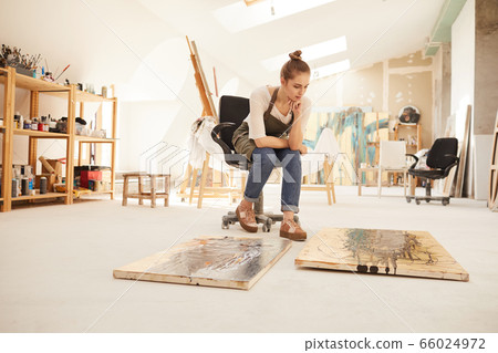 Modern female Artist Working in Studio Modern female Artist Working in Studio 66024972